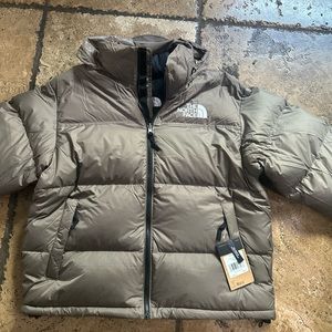 New with tags - North Face Jacket.  I have a Large and XL (I bought for $320)